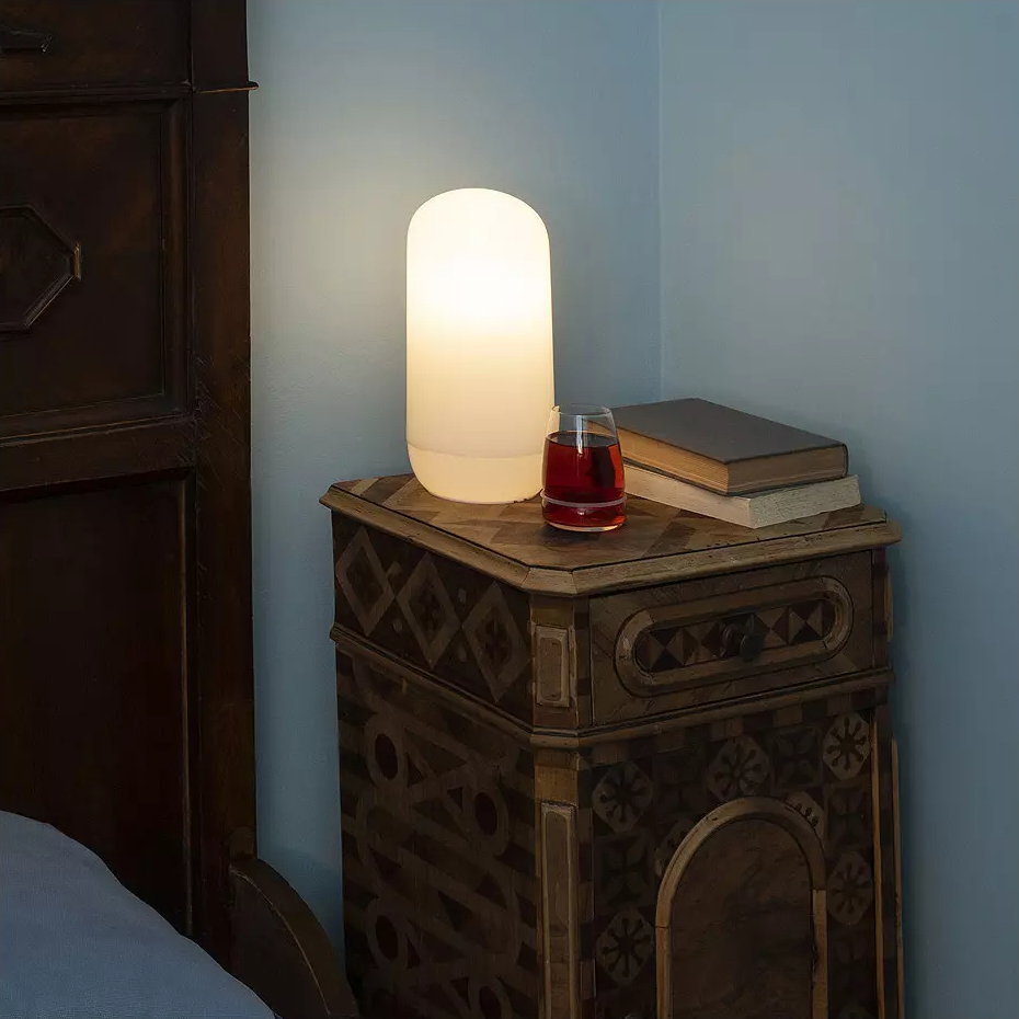 Gople LED Rechargeable Table Lamp on a nightstand at Lumens.com