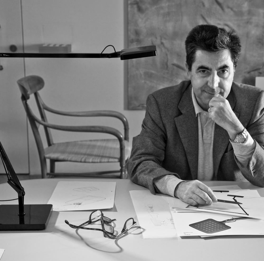 Antonio Citterio working on Kelvin Table Lamp designs.