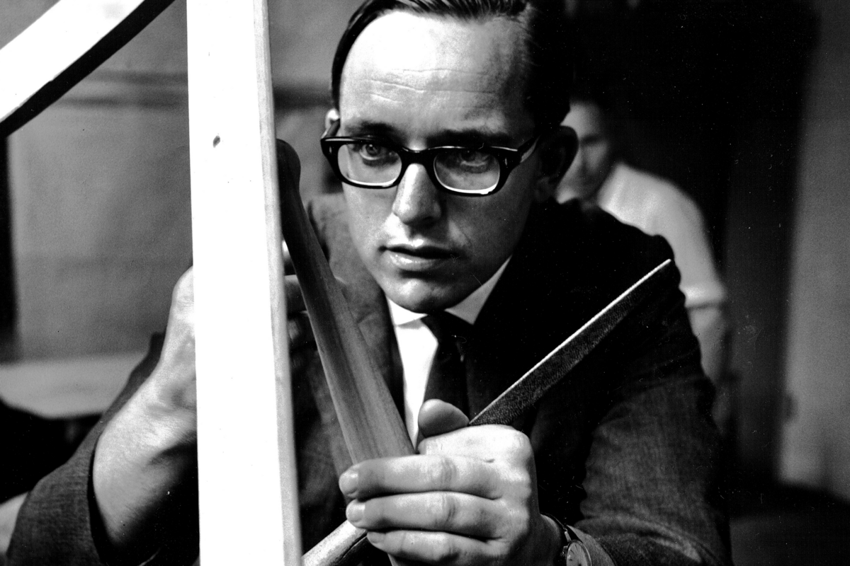 Black and white photo of designer with tools