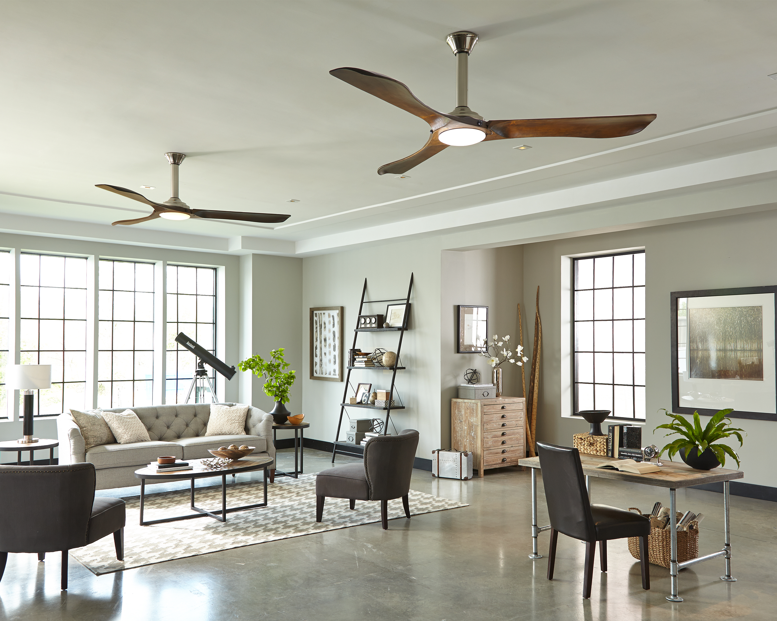 Minimalist Max Ceiling Fans in an open living room.