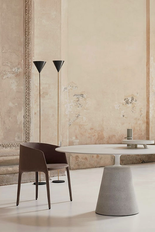 Achille Upholstered Dining Armchair by MDF Italia.