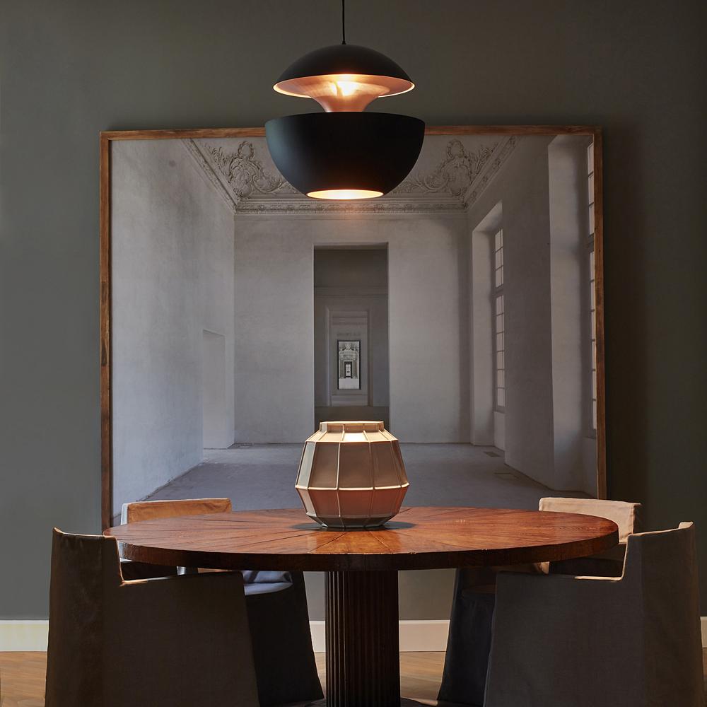 A darker, warmer way to light the dining room.