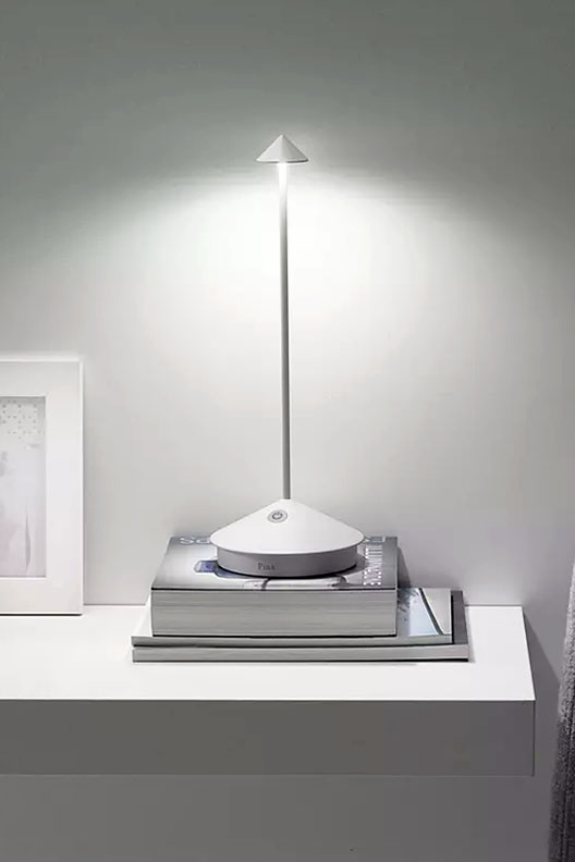 Pina Pro Rechargeable LED Table Lamp by Zafferano America.