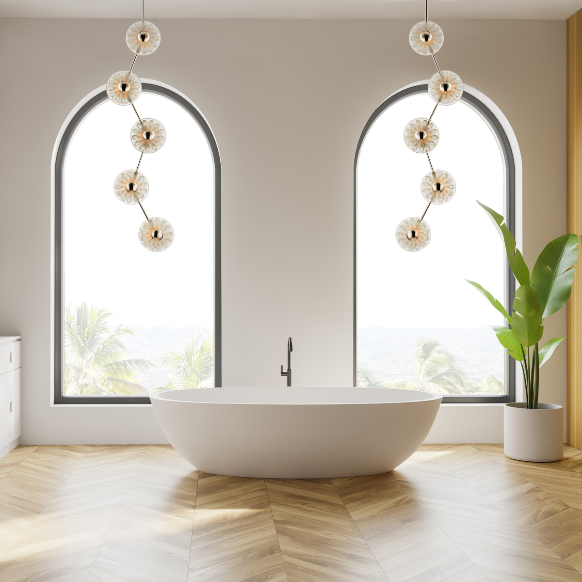 Two hanging crystal pendants over freestanding white bath tub 