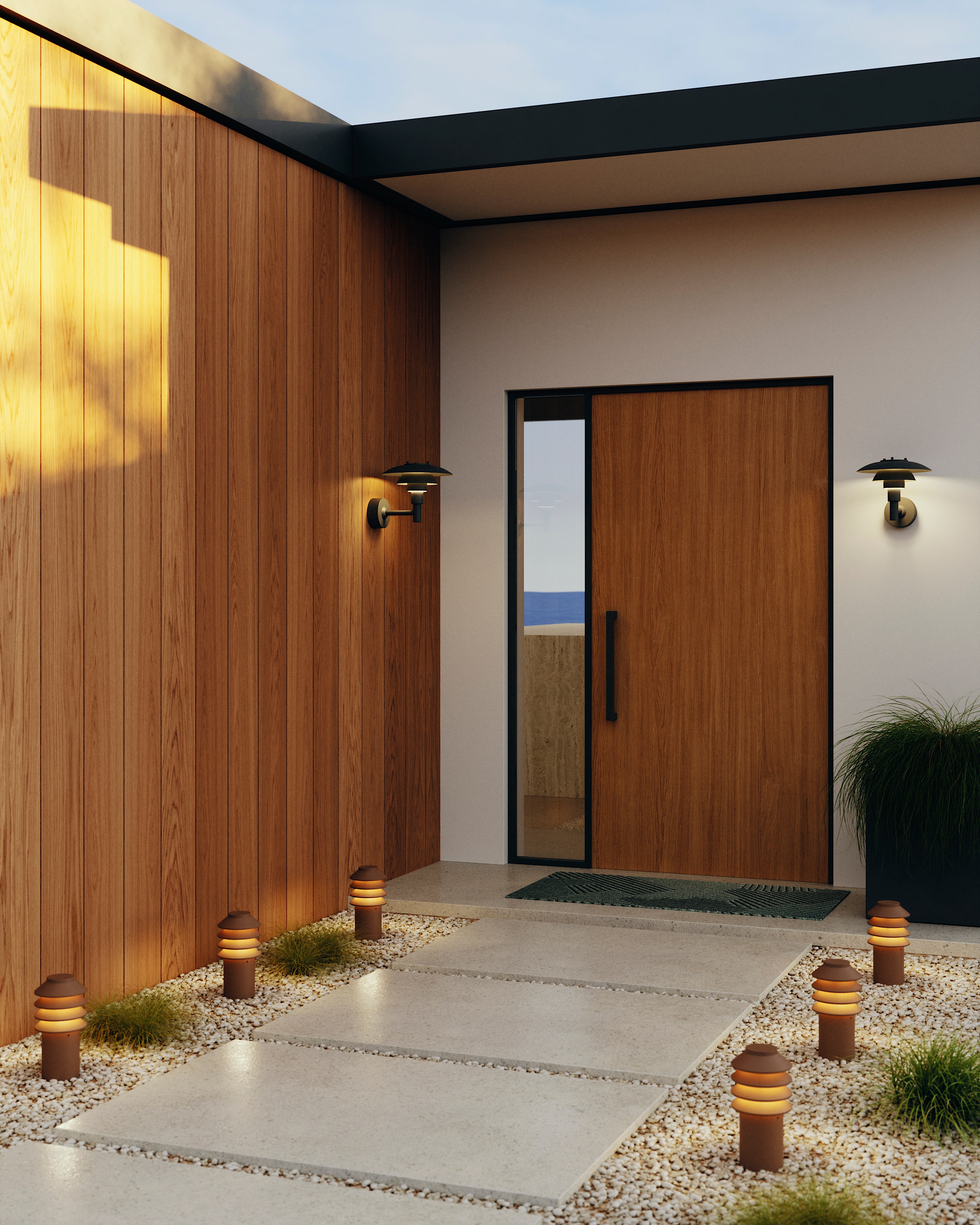 Front door and walkway to a mid-century style home, featuring Louis Poulsen outdoor path lights and wall lights. 