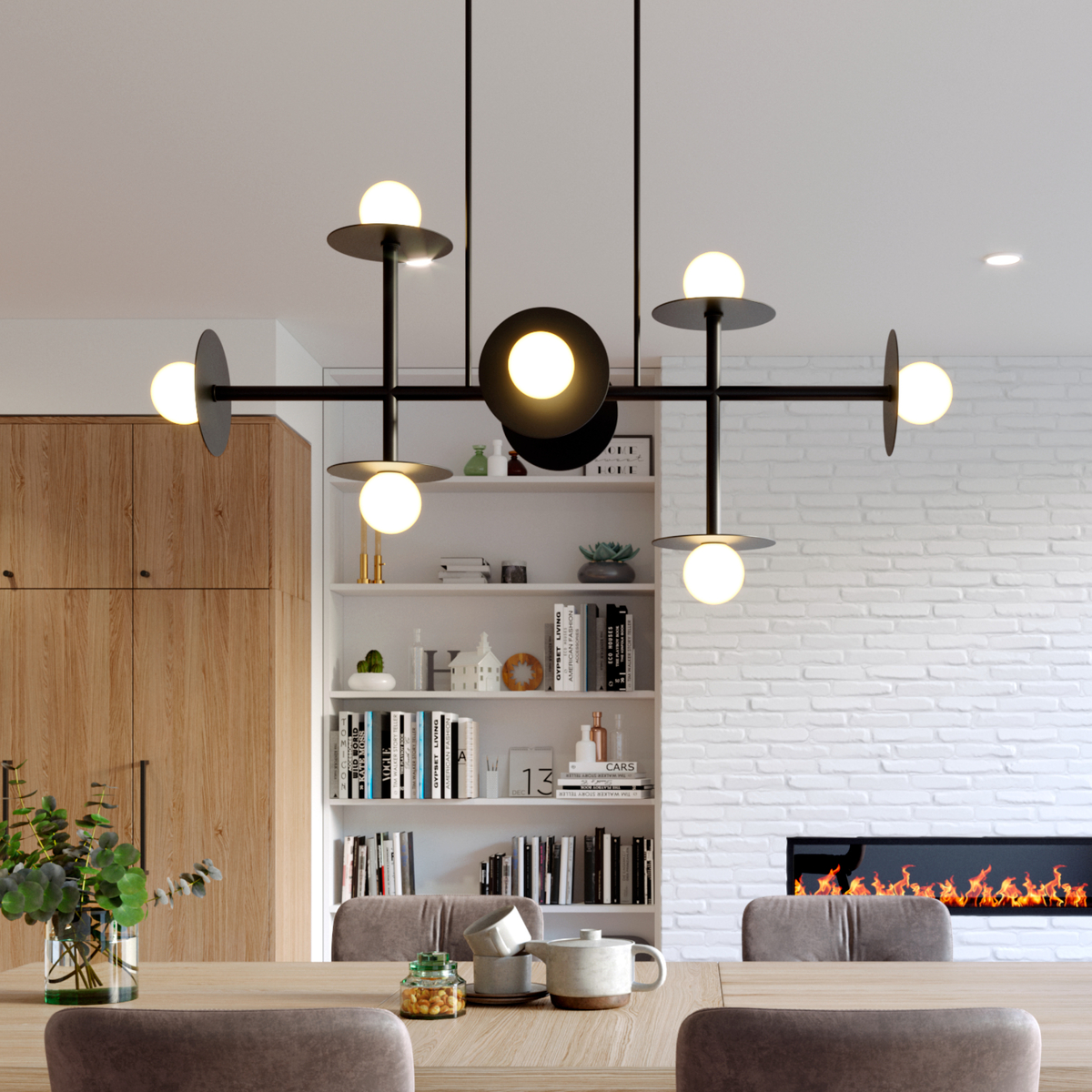 Black chandelier in white brick dining area with bookshelf