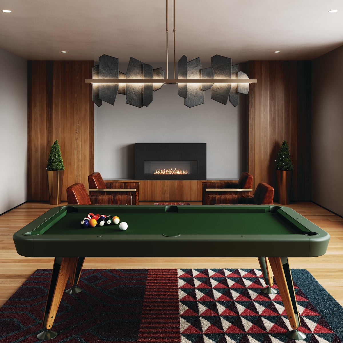 A pool table in a large and warm modern room.