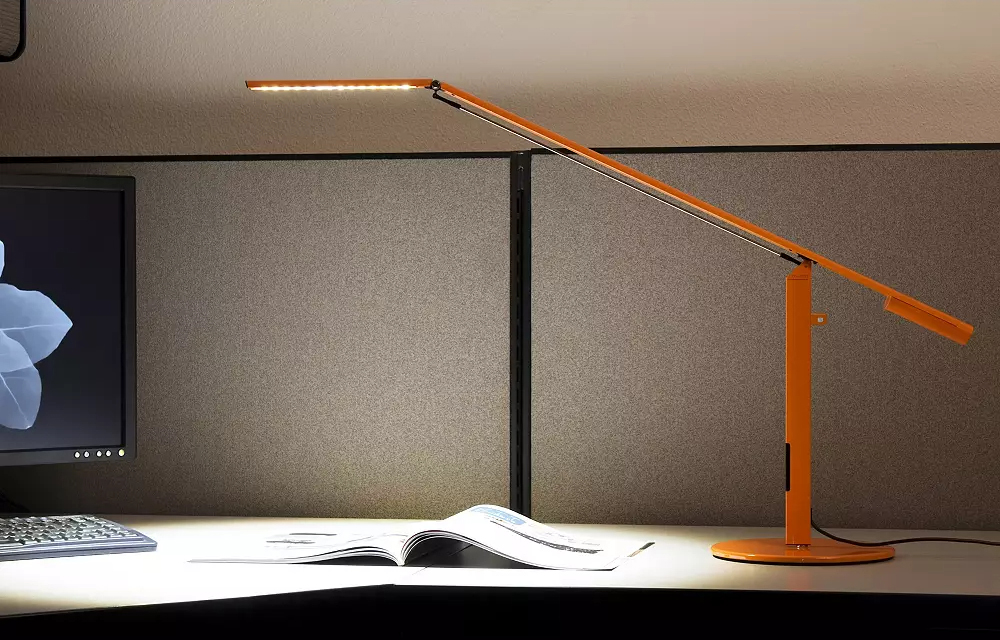 Equo Gen 3 LED Desk Lamp providing light at work.