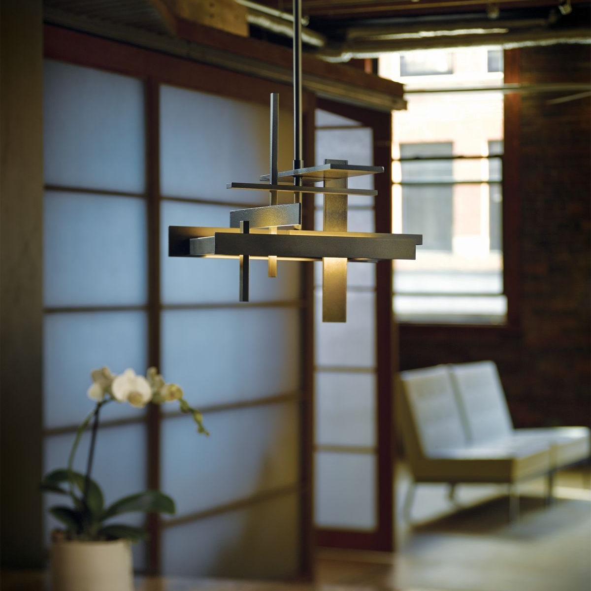 Angular pendant light in tranquil interior setting