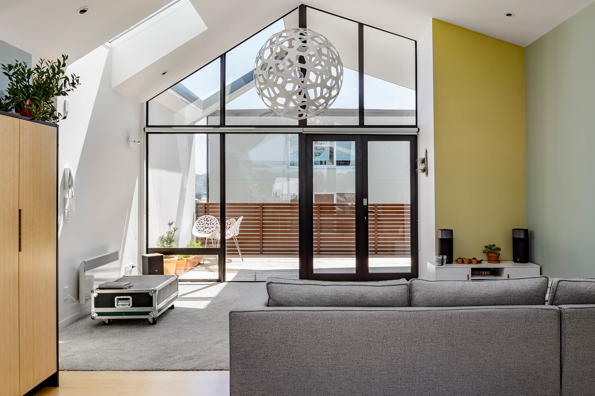 Coral Pendant in a wide living room.