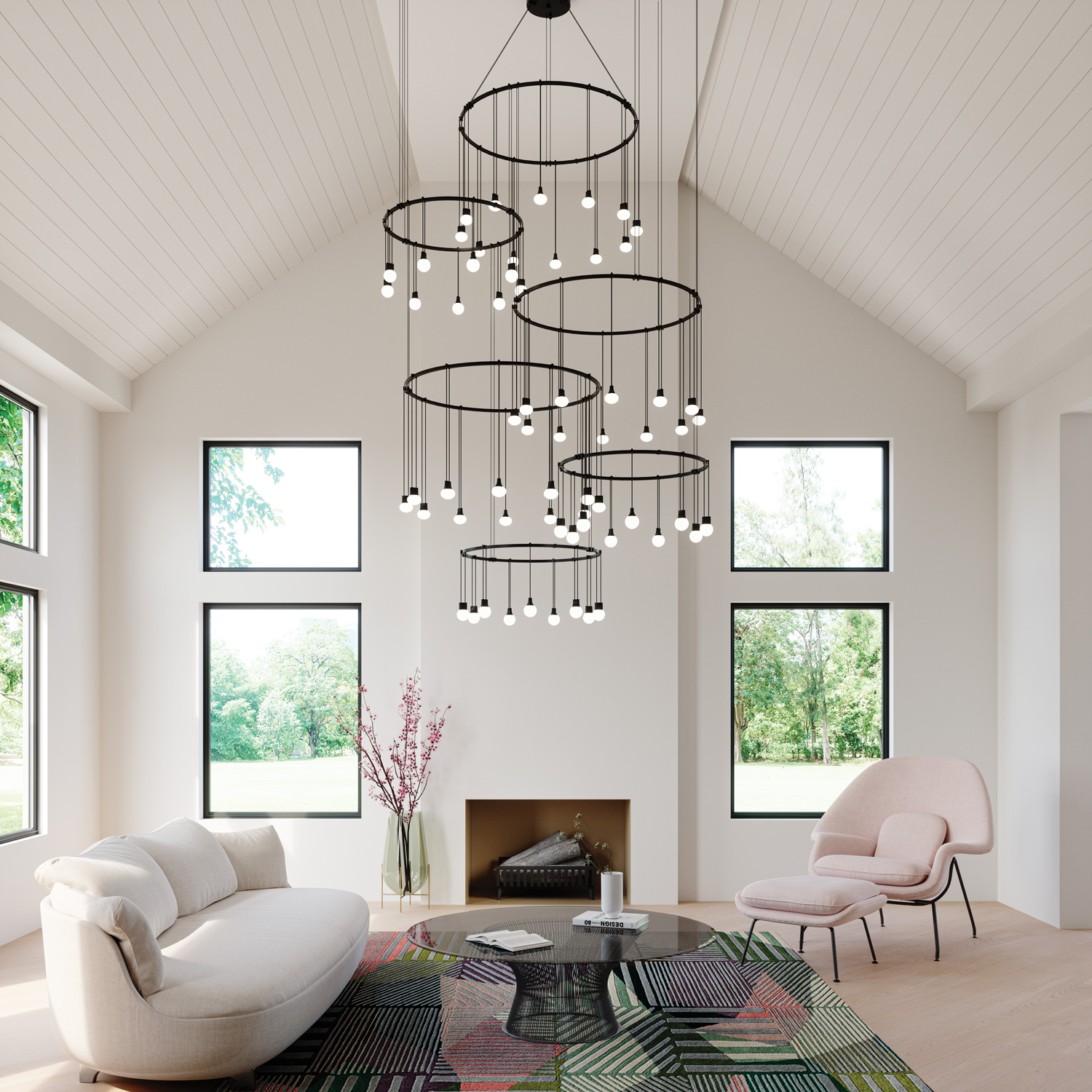 Suspenders 24-Inch LED Single Ring Chandelier in a vaulted ceiling living room.