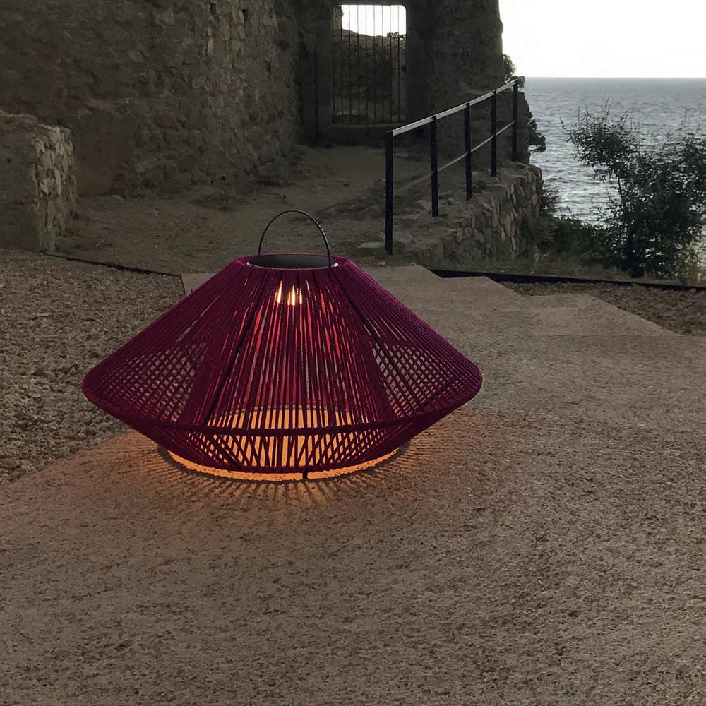 Koord KD.111 Portable Table Lamp outside by the coast.