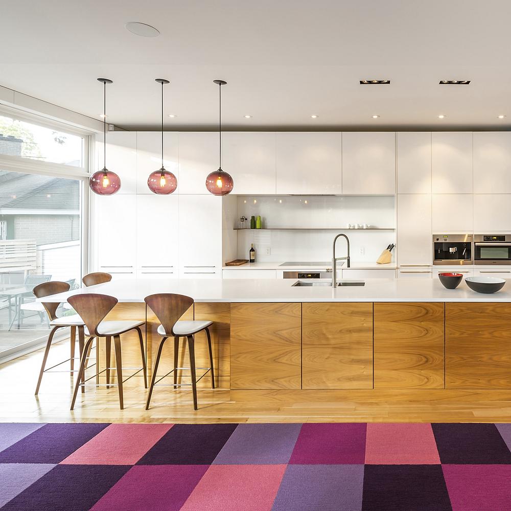 Solitaire Pendant and Cherner Side Chair in a large kitchen.