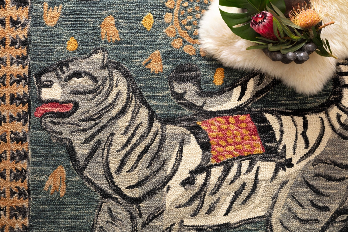 A rug depicting a tiger.