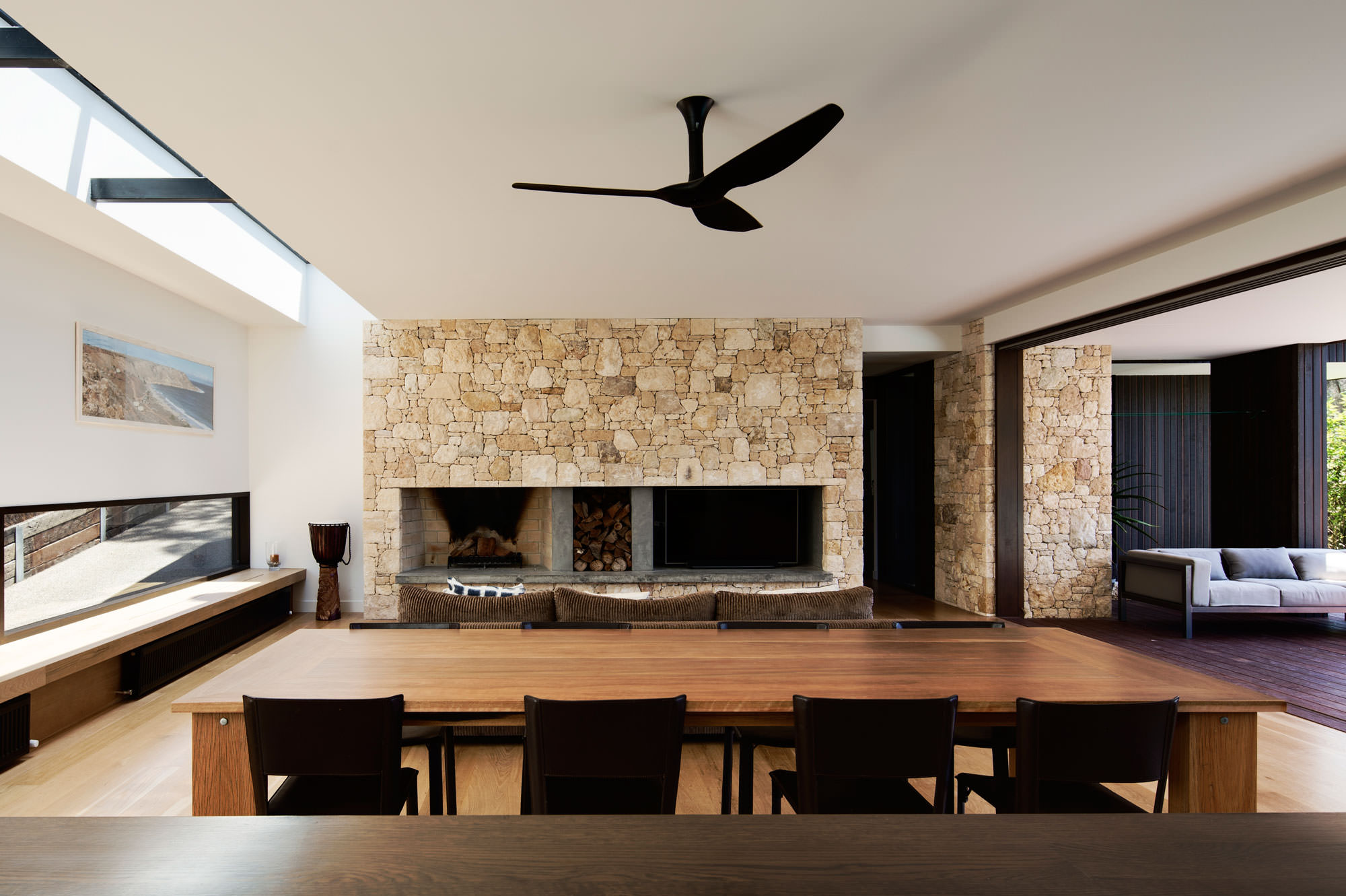 Ceiling fan in spacious dining room area.