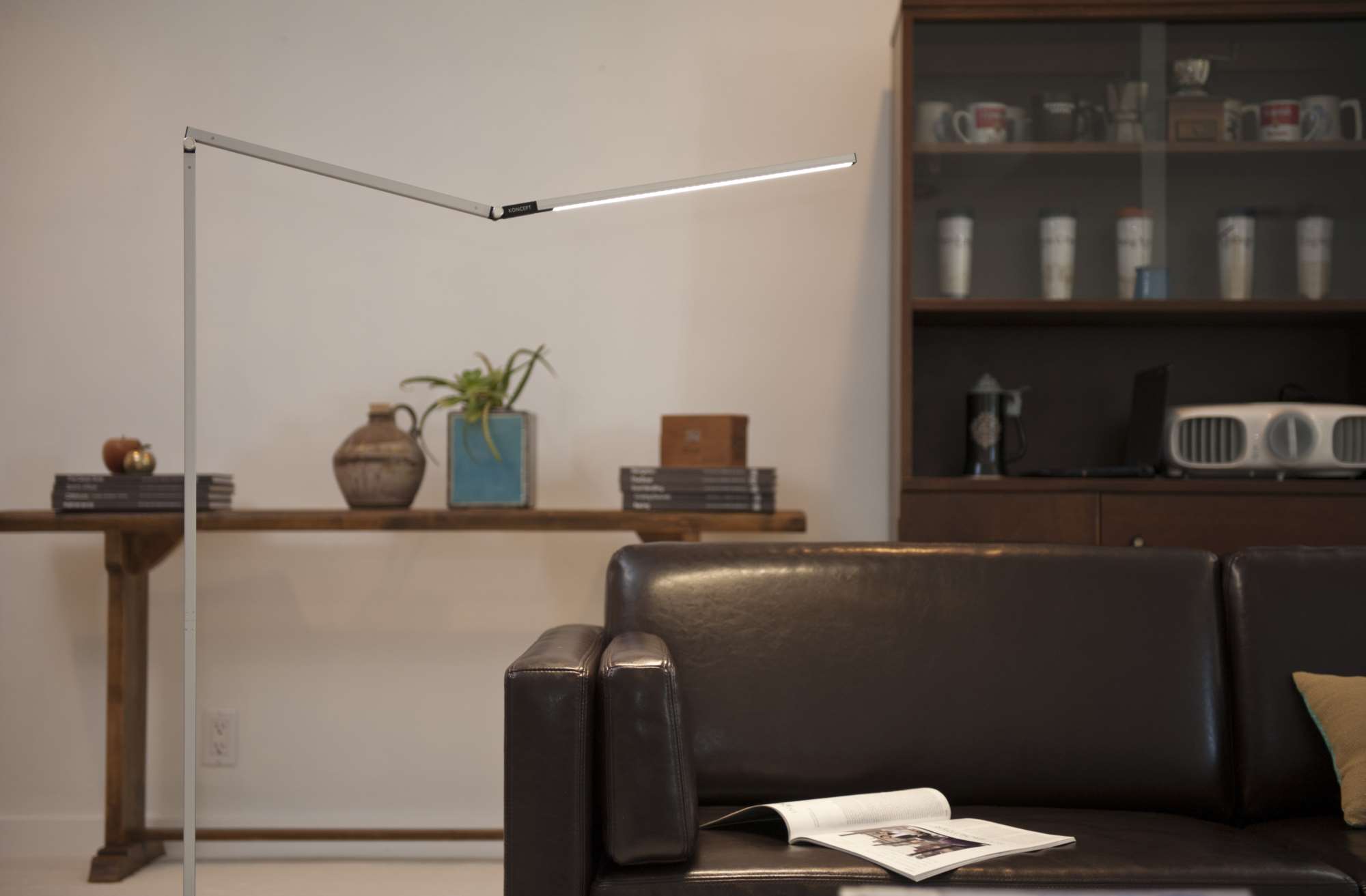 Z-Bar Gen 3 Floor Lamp over a lounge chair.