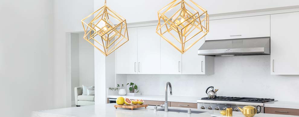 A Kitchen with Gold Pendant Lights