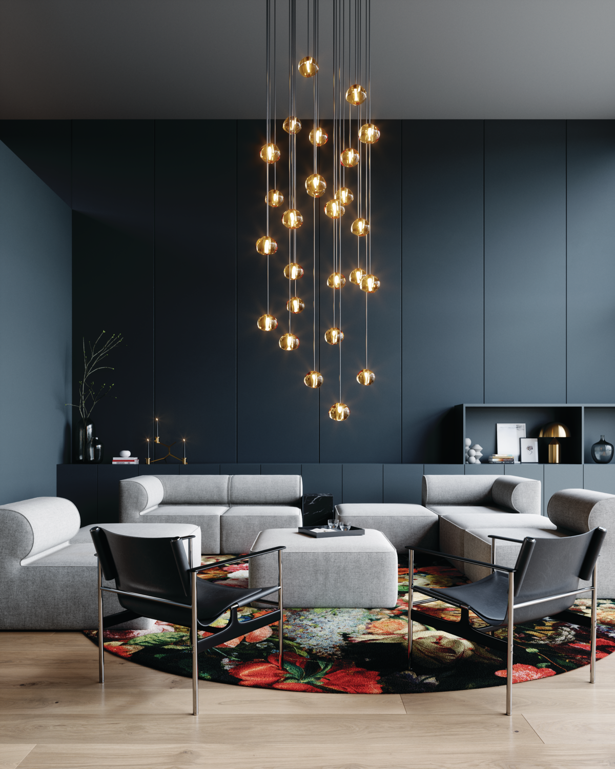 Dangling lights in gray room with gray modular couch 