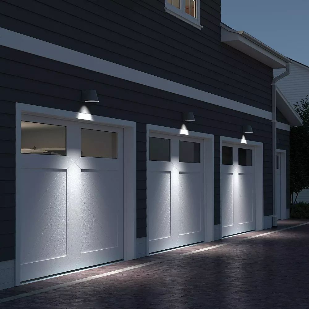 Downward illumination over dark outdoor garage